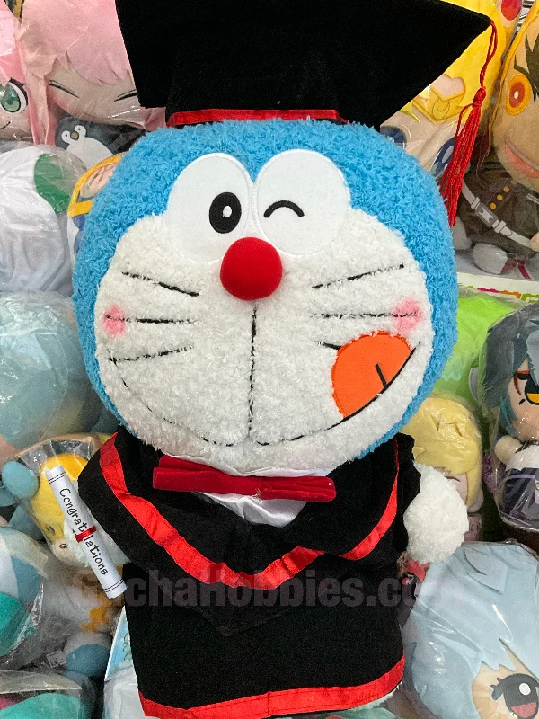 Playful and cheerful stuffed creaturesPlayful and cheerful stuffed creaturesGraduation Doraemon Licking Tongue Furry Medium Plush
