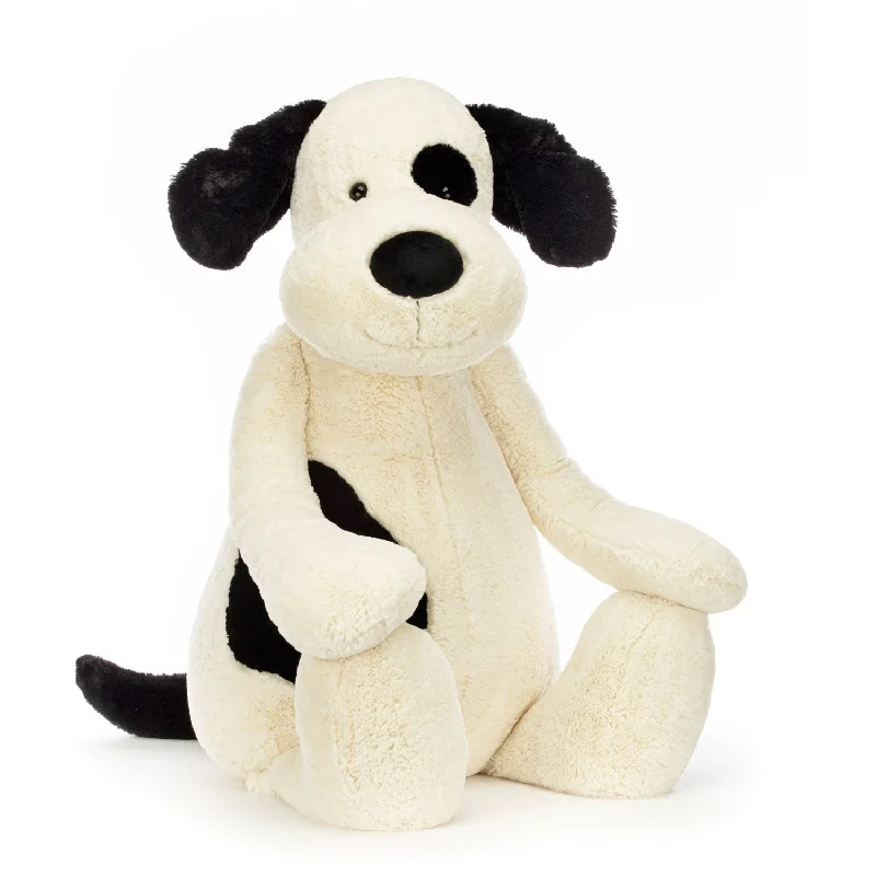 Cuddly and endearing Jellycat timeless appealJellycat Bashful Black/Creme Puppy 108 cm