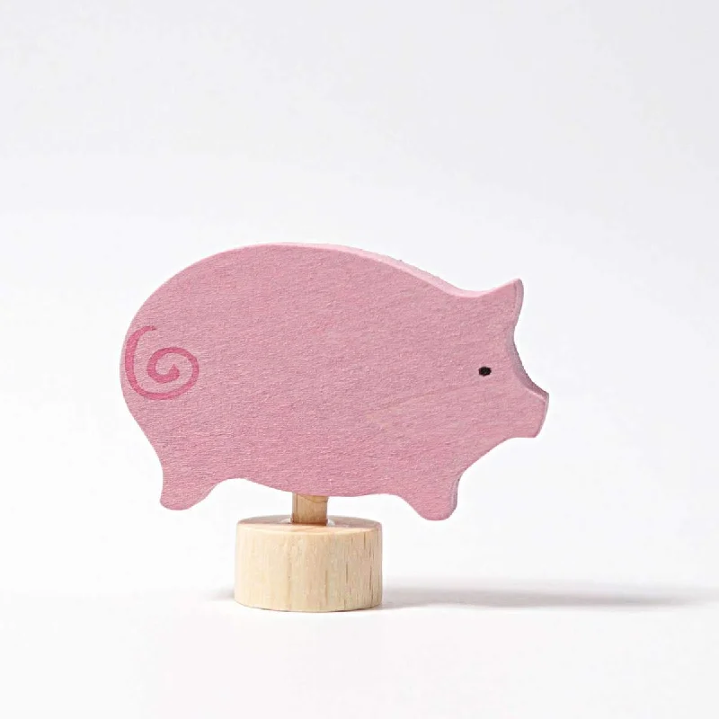 eco-friendly and sustainable wooden toys that promote environmental awareness                   Grimm's birthday ring deco pig